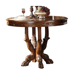The Dresden traditional collection reflects highly decorative details, pedestal table, oversized claw feet and decorative carving inlay veneers on apron. The dining chairs reflect carefully selected wood carving and upholstery in a symphony of material. M