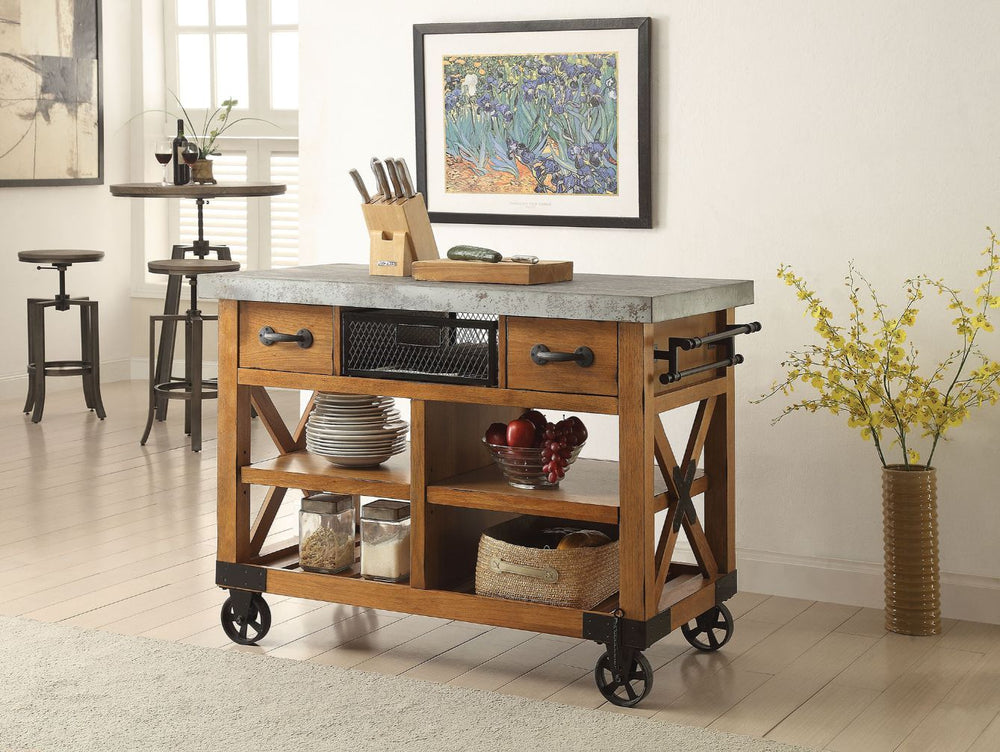 The Kailey kitchen cart with durable construction of wood and metal in a unique distress oak finish will become a stylish and function centerpiece of your home. The kitchen cart rests on casters, allowing you to move it easily. The storage space includes 