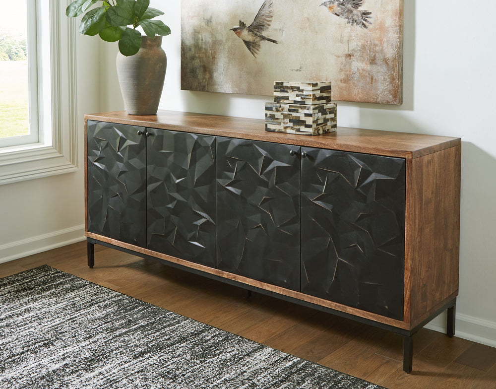 Revamp your home with this stylish accent cabinet. Featuring four doors with a captivating textured pattern, it instantly becomes the centerpiece of your room. The cabinet-'s interior shelves make it versatile for use as a buffet, console or media cabinet