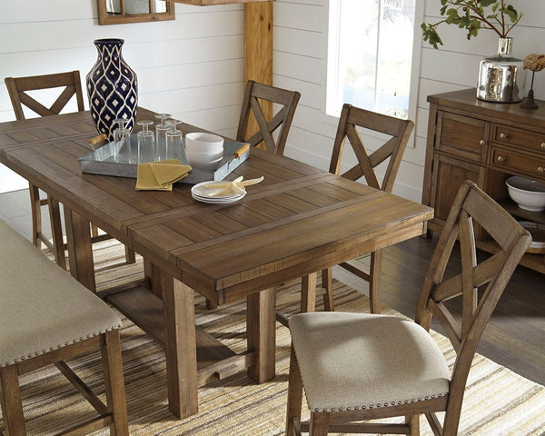  but a closer look reveals beauty in the details. From the through-tenon pedestal base to the plank-effect table top and distressed nutmeg finish
