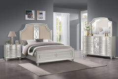 Step into timeless elegance with the Reflection 4 Piece Bedroom Set in Silver, featuring a bed, dresser, mirror, and nightstand. Crafted from solid Pine and manufactured wood, this collection ensures enduring quality and strength. The glamorous matte silv