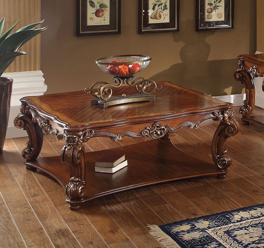 KD, Square Table w/Scrolled Leg and Bottom Shelf â€¢ Top Apron: Scrolled Decor Trim<br/><br/><b>Product Features</b><ul><li>Case: 1Pc/1Ctn</li><li>Finish: Cherry</li><li>Style: Vintage</li><li>Materials: Wood, Poly Resin, Veneer (Wood)</li></ul><br/>