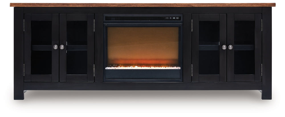 Raise the bar on modern farmhouse style with this TV stand with electric fireplace. Its sturdy silhouette and casual good looks are accentuated with a two-tone finish, which pairs a warm satin black base with a contrasting butcher block veneer top. Glass 