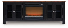 Raise the bar on modern farmhouse style with this TV stand with electric fireplace. Its sturdy silhouette and casual good looks are accentuated with a two-tone finish, which pairs a warm satin black base with a contrasting butcher block veneer top. Glass 