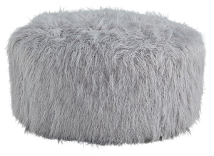Don-'t shy away from decadence. Add a bit of bold design to your room with this oversized accent ottoman. The faux fur upholstery has a luxe look, and its casual light gray hue allows this plush piece to make a stylish statement in a variety of spaces.<br