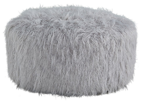 Don-'t shy away from decadence. Add a bit of bold design to your room with this oversized accent ottoman. The faux fur upholstery has a luxe look, and its casual light gray hue allows this plush piece to make a stylish statement in a variety of spaces.<br