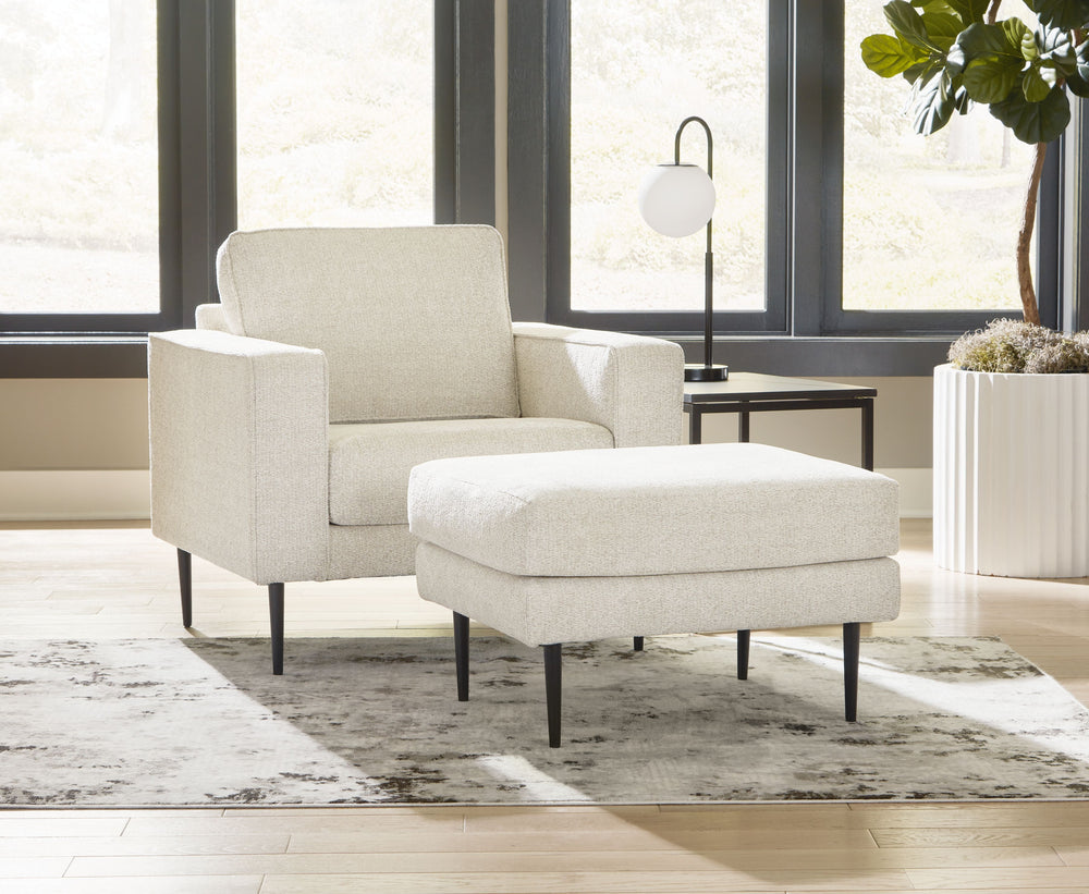 Simple comfort meets modern function in this living room set. An apt addition to apartments and other small spaces, the slim-profiled piece welcomes you with its cozy character. A subtle chevron pattern on the cushions refreshes the classic neutral hue, e
