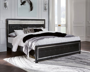 Rest easy. The luxurious look youâ€™ve been dreaming of is yours for the taking, at a price sure to put you at ease. This king upholstered panel bed brings a sense of old Hollywood with a contemporary flair. A deep, dark finish, faceted chrome-tone accent