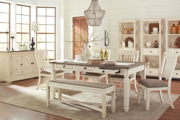 Unique two-tone finish with a combination of Oak and Acacia substrates combining a trendy textured antique white color with table and server tops finished in a textural weathered oak finish. Rectangular dining table features six convenient drawers for sto
