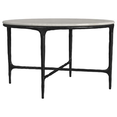 This coffee tableâ€™s genuine marble top rests on a sculptural metal frame, its subtly textured legs evoking artisanal craftsmanship. Present it as a center table, enhancing a refined lounge area. The marble surface makes an ideal backdrop for dÃ©cor, whi