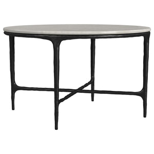 This coffee tableâ€™s genuine marble top rests on a sculptural metal frame, its subtly textured legs evoking artisanal craftsmanship. Present it as a center table, enhancing a refined lounge area. The marble surface makes an ideal backdrop for dÃ©cor, whi