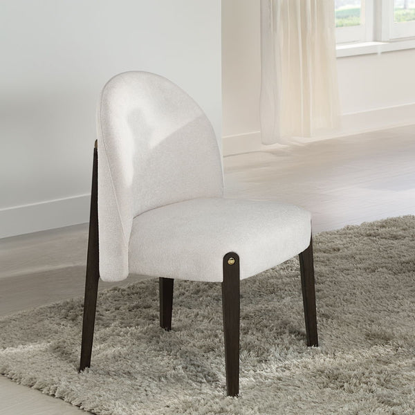 Clayten collection exudes elegance with its rectangular dining table featuring a fixed white marble top and double pedestal base with metal trim. Paired with upholstered chairs and a server with metal legs, this set blends sophistication and contemporary 