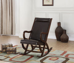The Triton Rocking Chair combines style and comfort with a handsome modern design. This beautiful accent chair has a walnut frame and is upholstered in a rich PU with nailhead trim creating a vintage look. This stylish chair features an upholstered back w