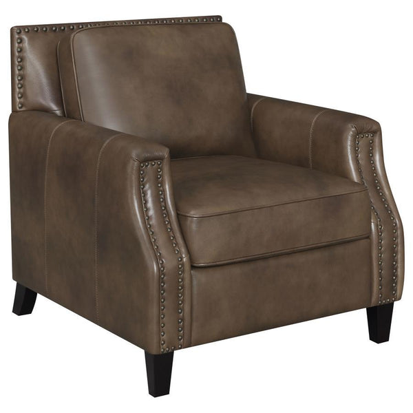 Sit back and settle into this leather grain upholstered armchair. Recessed arms and pillow top cushions make for an exceptionally comfortable seating space. Nail head trim enhances the frame while welted trim on the cushions creates aesthetic interest. Lu