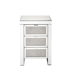 The Lavina occasional table brings glam styling to your home. The quality construction of this table features a combination of mirrored glass and composite wood, ensuring a design that endures. Three drawers with faux diamonds Inlay drawer fronts, It-'s j