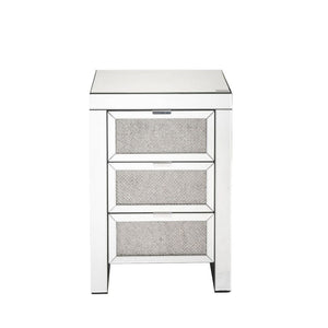 The Lavina occasional table brings glam styling to your home. The quality construction of this table features a combination of mirrored glass and composite wood, ensuring a design that endures. Three drawers with faux diamonds Inlay drawer fronts, It-'s j