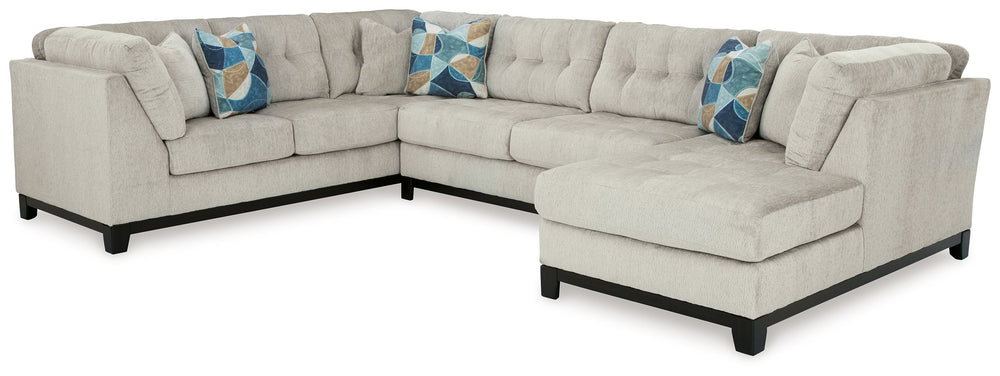 Fresh, on-trend style meets functionality in this sectional with chaise. Details like tufted cushions and a wrap-around accent base reflect your urban contemporary tastes while staying versatile as your style changes. And with its soft upholstery, your co
