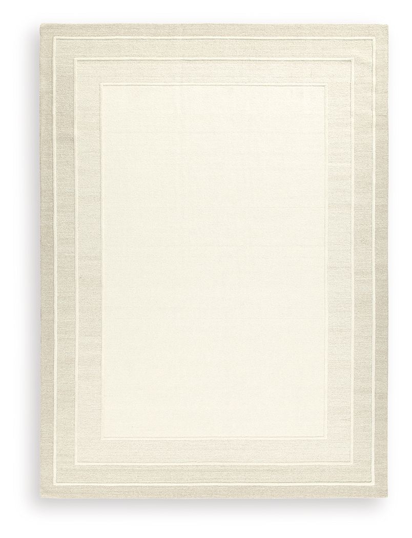 With its simple border design and soft, neutral color palette, this hand-tufted rug brings a touch of casual elegance to your abode. Its plush wool pile feels luxuriously soft underfootâ€”perfect for adding warmth and texture to your entertainment area, b