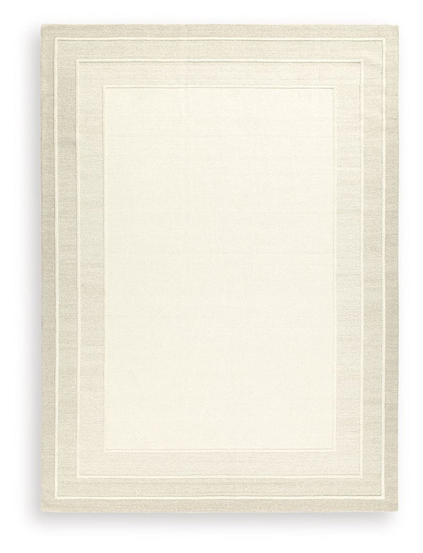 With its simple border design and soft, neutral color palette, this hand-tufted rug brings a touch of casual elegance to your abode. Its plush wool pile feels luxuriously soft underfootâ€”perfect for adding warmth and texture to your entertainment area, b
