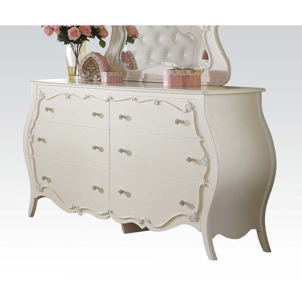 Create the dream bedroom for your little girl with Edalene collection. Beautiful accents are seen throughout including clear rosette knobs and tapered legs. The bed features a pearl white tufted headboard. With many storage options and details like floral