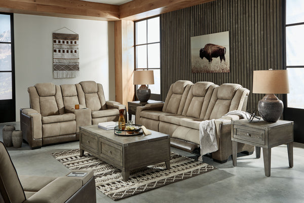 This sleek, ultra-modern power reclining living room set has it all. With designer looks and head-to-toe comfort, the reclining sofa with drop-down table has the upscale look of leather at a scaled-down faux leather price. Its two-tone upholstery is more 