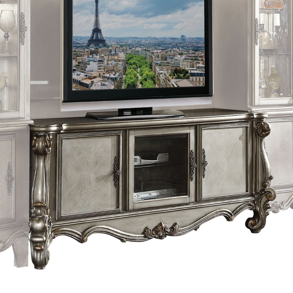 The Versailles the TV Stand was inspired by old European design. This collection features carved scrollwork accent on legs and trim base. Carefully crafted with selected wood and veneers in antique platinum finish with hand brush accents. Offers plenty of
