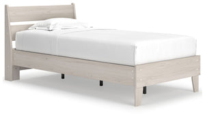 Bringing big style to small living areas, this twin panel platform bed is a smart, space-saving choice for those with an eye for contemporary design. Its clean-lined profile with understated refinements creates such a simple silhouette that works in so ma