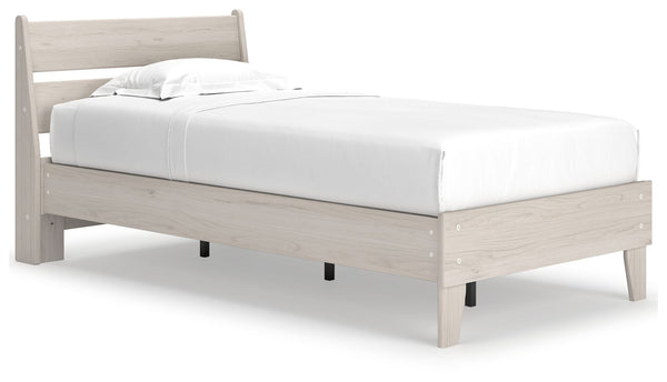 Bringing big style to small living areas, this twin panel platform bed is a smart, space-saving choice for those with an eye for contemporary design. Its clean-lined profile with understated refinements creates such a simple silhouette that works in so ma