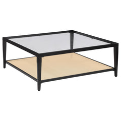 Enhance your living room with the contemporary charm of this sleek square coffee table. The black powder-coated metal frame creates a clean, modern aesthetic, while the recessed clear tempered glass top provides an elegant and spacious surface for your de