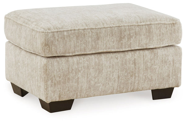 This ottoman speaks to those drawn to fresh, contemporary style with richly neutral appeal. Its firmly cushioned top offers room for comfort. Subtle and sophisticated, the plush upholstery and dark tri-block legs are a natural complement for so many color