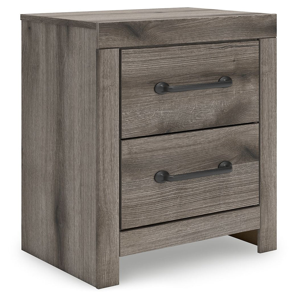 Combining a casual aesthetic with functional flair, this nightstand suits styles from rustic to industrial. Its smooth-gliding drawers store essentials with ease. Ready to recharge? Included USB ports allow you to keep go-to devices close. Dressed in a ch