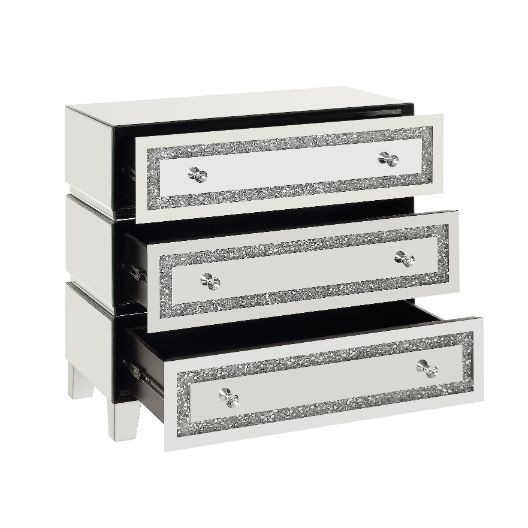 The Noor Cabinet will add a contemporary touch to any room in your home. With its clean lines and faux diamond inlay, this brilliant cabinet showcases a distinctive style for an intriguing look. The cabinet features two doors and two storage drawers with 