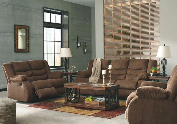 This reclining set puts the win in winning. Its waterfall back design and doubly plump pillow top arms team up with soft chenille fabric to go for the goal. Ample seating room makes the comfort possibilities endless. Sit back and relax. You wonâ€™t go wro