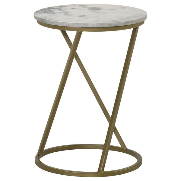 A seamless blend of classic elegance and modern design, this round accent table features a solid white marble top, bringing a timeless and sophisticated touch to any space. The sculptural metal base, finished in a warm antique gold, showcases a graceful g