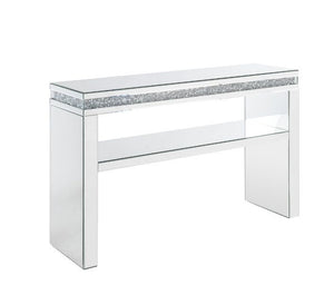 Undeniably magnificence with glam flair, this Noralie Sofa Table is meant to become your favorite focus in your living room. Mirrored accents with faux diamonds inlay achieve a modern glamour look. This piece makes a glam style statement that offers a sat