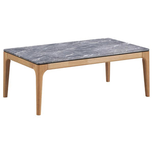 The coffee table stretches out with a confidence born of its mid-century modern heritage, flaunting a rectangular top that offers the luxurious look of marble without the weight. Its high-pressure laminate surface, infused with decorative faux marble lami