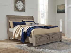 Satisfying your taste for tradition, this California king sleigh bed with storage sports serene sophistication. Forever classic design detailsâ€”inlaid panels, silvertone patina hardware and bun feetâ€”are so easy to love. Burnished light gray finish elev