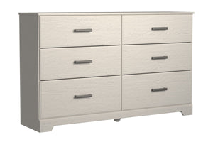With its clean-lined look and modern attitude, this dresser is a fresh style awakening. A crisp, white hue over subtle replicated wood grain easily complements other furniture finishes. Smooth drawer fronts with antiqued pewter-tone handles complete the a