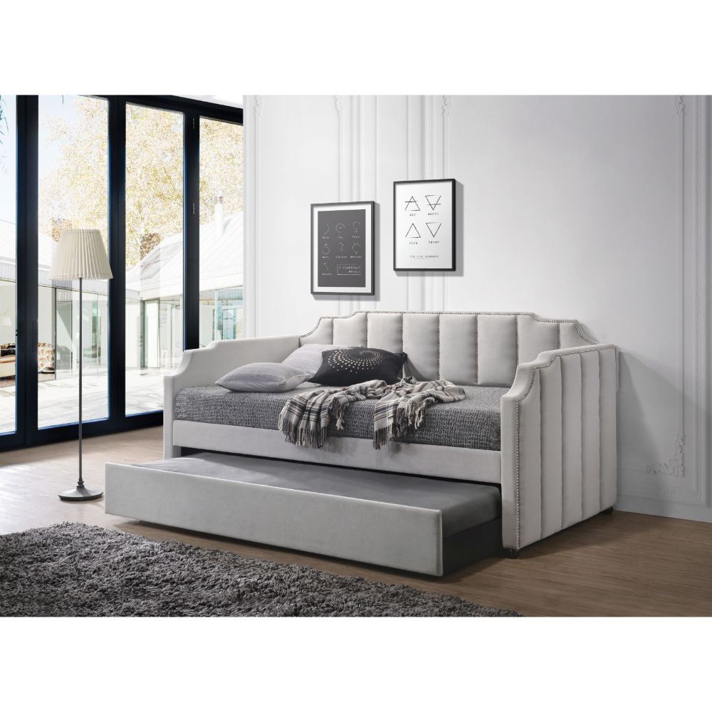 The Peridot traditional vintage upholstered daybed with trundle brings relaxed elegance and comfort to your home. It is crafted with engineered wood and thick foam padding around the frame for added comfort. The smooth velvet upholstery features horizonta