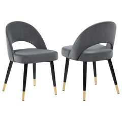 Add a touch of retro-inspired elegance to your dining room with this stylish dining side chair, featuring an elegant bucket-style seat that embodies Mid-Century modern charm. Wrapped in luxurious velvet, each chair provides a supportive, long-lasting seat
