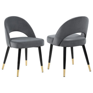 Add a touch of retro-inspired elegance to your dining room with this stylish dining side chair, featuring an elegant bucket-style seat that embodies Mid-Century modern charm. Wrapped in luxurious velvet, each chair provides a supportive, long-lasting seat