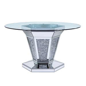 Cultivate a contemporary aesthetic in your entertainment ensemble with this distinctive Noralie dining table. Offering a modern twist on a classic pedestal-style silhouette, this design showcases an angular base with mirror and faux diamond inlay and uniq