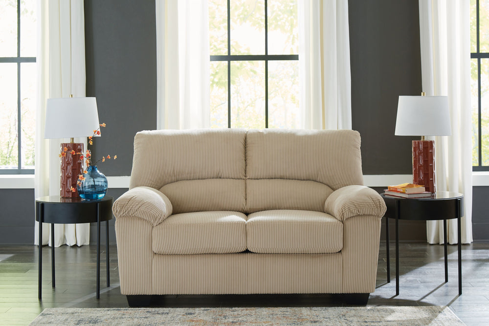 This loveseat is a cozy interpretation of casual contemporary style. Its super-soft corduroy makes curling up with a book or your favorite show that much more comfortable. You-'re sure to appreciate its sincere styling and homey approach to relaxation.<br