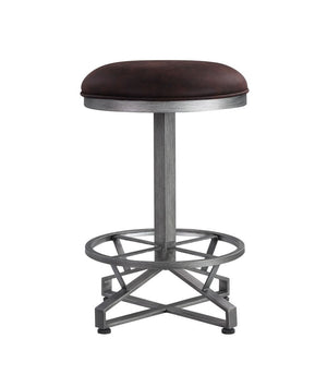 Seating is essential to your dining room dÃ©cor. This versatile stool will bring in industrial home bar design into your space. It offers a round seat cushion with rustic brown upholstery for a great texture and feel. Metal cross base with footrest gives 