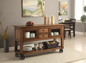 The Kadri kitchen cart with durable construction of wood and metal in a unique distress chestnut finish will become a stylish and function centerpiece of your home. The kitchen cart rests on casters, allowing you to move it easily. The storage space inclu