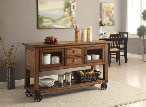 The Kadri kitchen cart with durable construction of wood and metal in a unique distress chestnut finish will become a stylish and function centerpiece of your home. The kitchen cart rests on casters, allowing you to move it easily. The storage space inclu