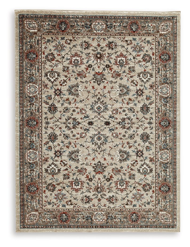 The muted tones and floral pattern of this rug lends classic character to your living space. Its traditional feel is made more modern with shades of blue, brown, rust and cream. Timelessly designed, it helps you to craft your ideal aesthetic from the grou