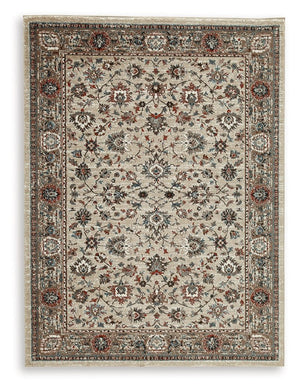 The muted tones and floral pattern of this rug lends classic character to your living space. Its traditional feel is made more modern with shades of blue, brown, rust and cream. Timelessly designed, it helps you to craft your ideal aesthetic from the grou