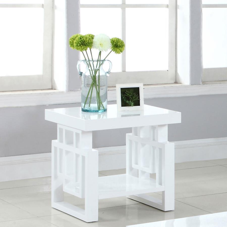 This modern square end table is a stylish addition to any living room or bedroom. Made from durable engineered wood, it features a sleek white high-gloss finish for a polished and contemporary look. The geometric leg design adds a unique architectural ele