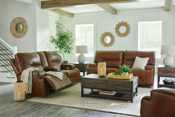 Master statement-making contemporary comfort with this set. It displays a striking yet streamlined profile, with auburn-hued leather match upholstery balancing natural beauty and refined design. An adjustable headrest and USB charging polish off this rich